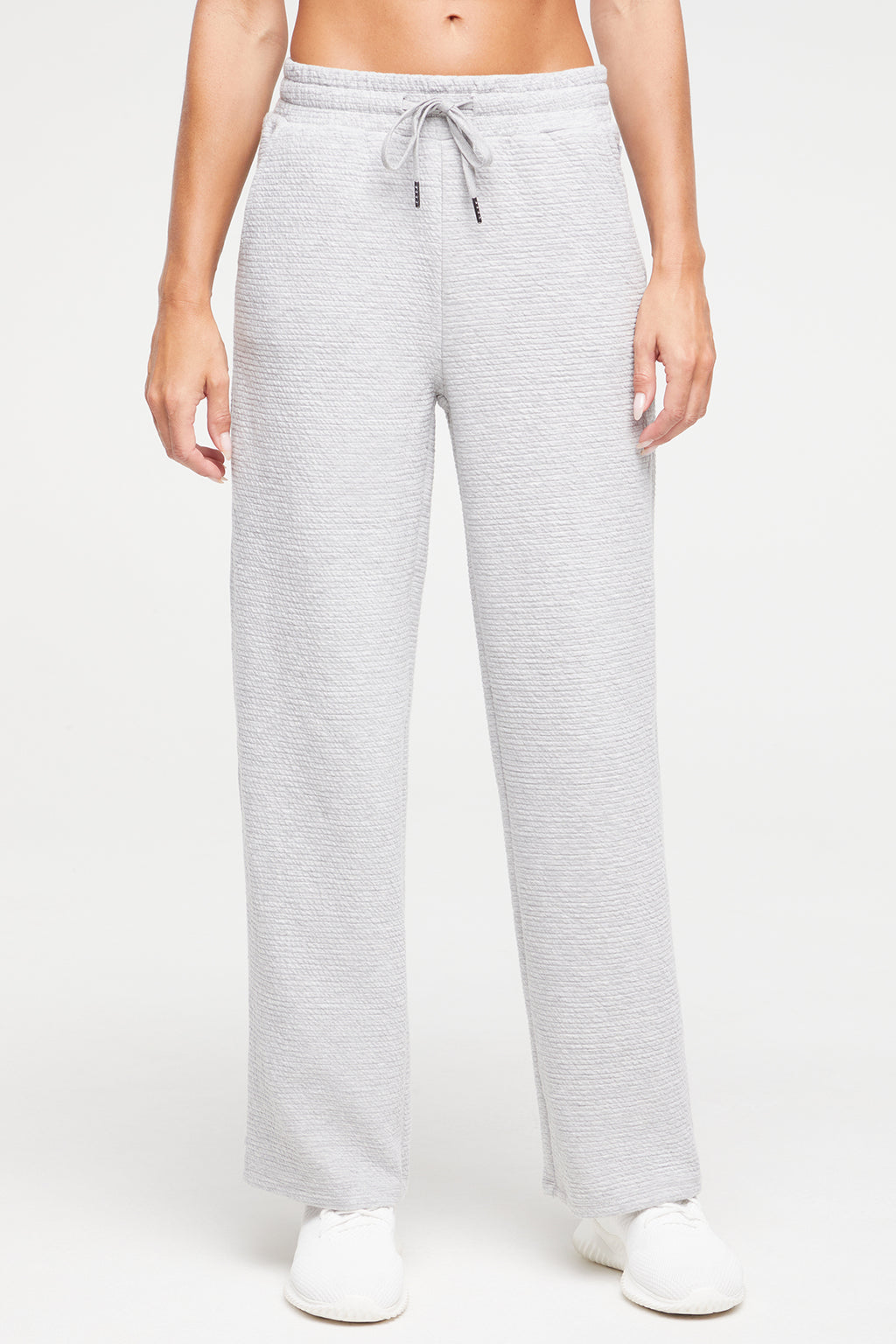 Freyi Pant, alternate angle view, showing visible design features and texture of the durable stretch fabric.. #color_heather-grey