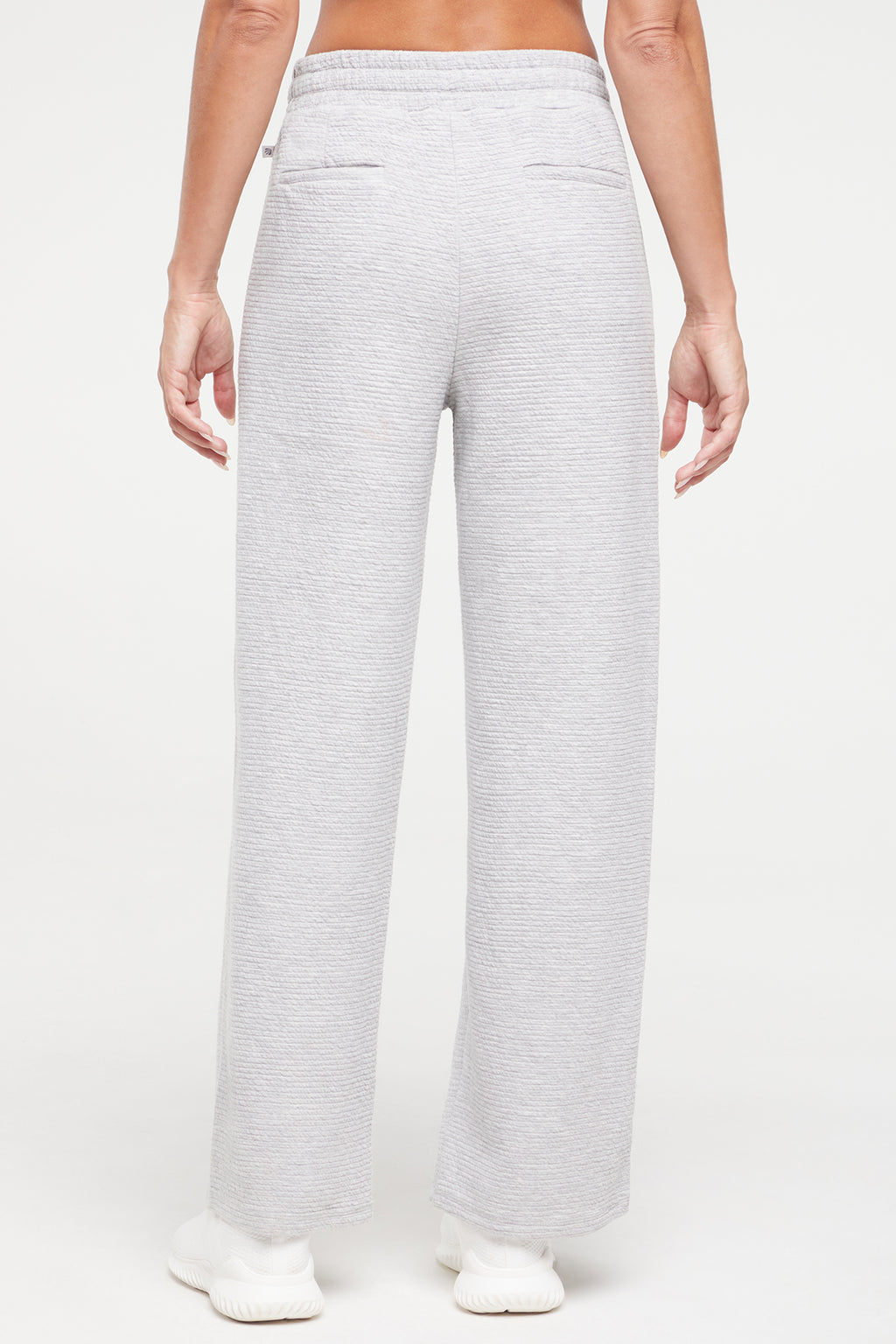 Freyi Pant, alternate angle view, showing visible design features and texture of the durable stretch fabric.. #color_heather-grey