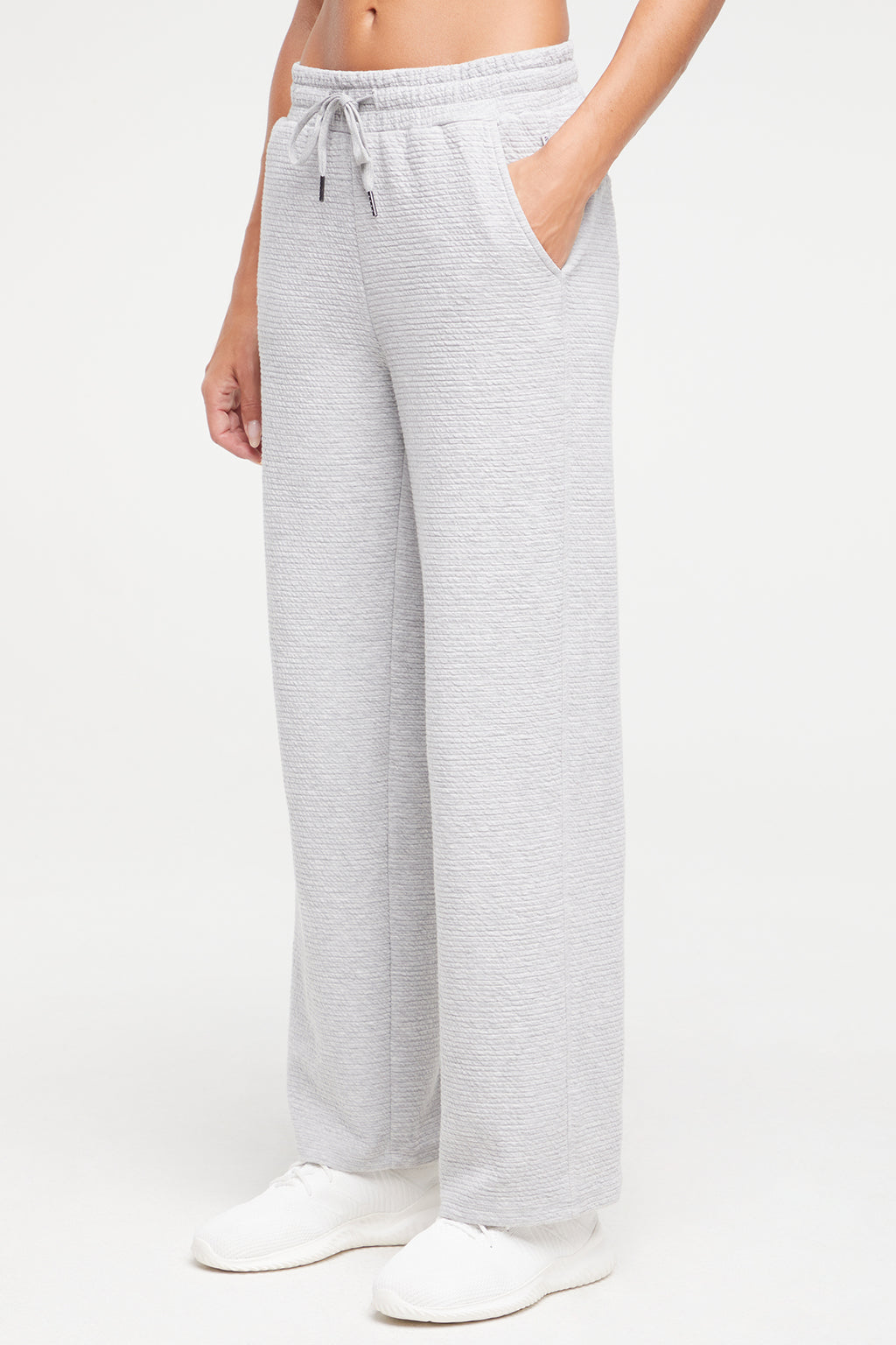 Freyi Pant, alternate angle view, showing visible design features and texture of the durable stretch fabric.. #color_heather-grey