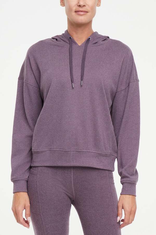 Riley Hoodie, alternate angle view, showing visible design features and texture of the soft fleece fabric.. 