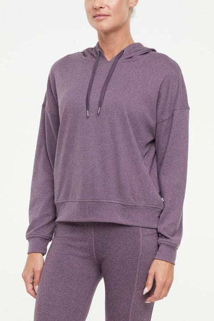 Riley Hoodie, alternate angle view, showing visible design features and texture of the soft fleece fabric.. 