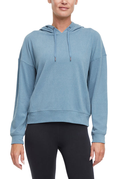 Riley Hoodie, close-up view of fabric and stitching, showing visible design features and texture of the soft fleece fabric.. 