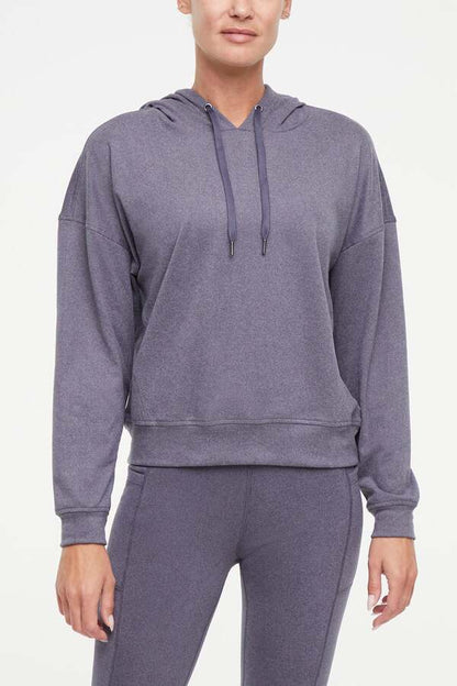 Riley Hoodie, alternate angle view, showing visible design features and texture of the soft fleece fabric.. 