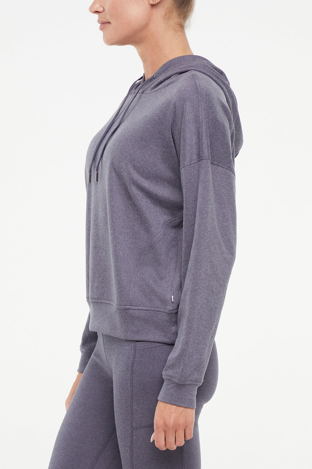 Riley Hoodie, alternate angle view, showing visible design features and texture of the soft fleece fabric.. #color_heather-graphite