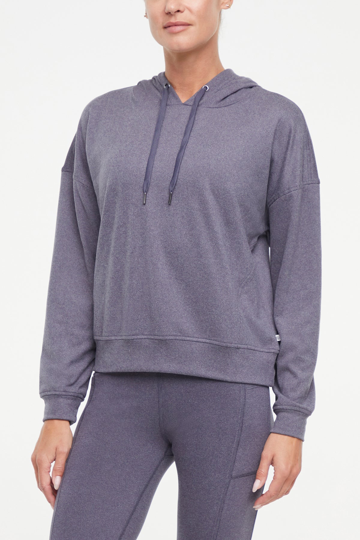 Riley Hoodie, alternate angle view, showing visible design features and texture of the soft fleece fabric.. 