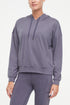 Riley Hoodie, alternate angle view, showing visible design features and texture of the soft fleece fabric.. 