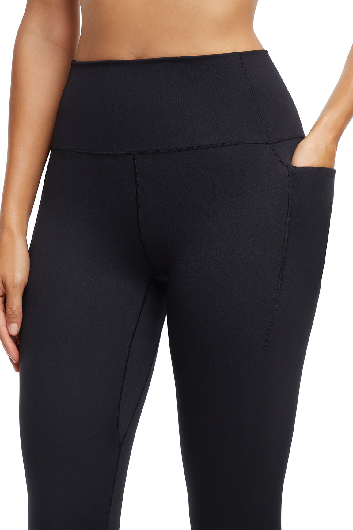 Kelly Side Pocket Legging, alternate angle view, showing visible design features and texture of the stretch knit fabric.. 