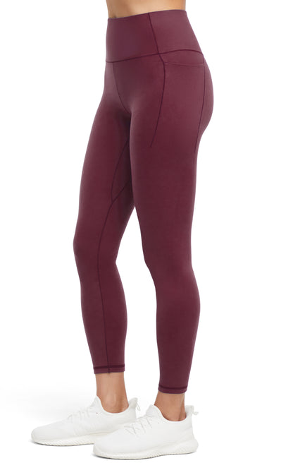 Kelly Side Pocket Legging, alternate angle view, showing visible design features and texture of the stretch knit fabric.. 