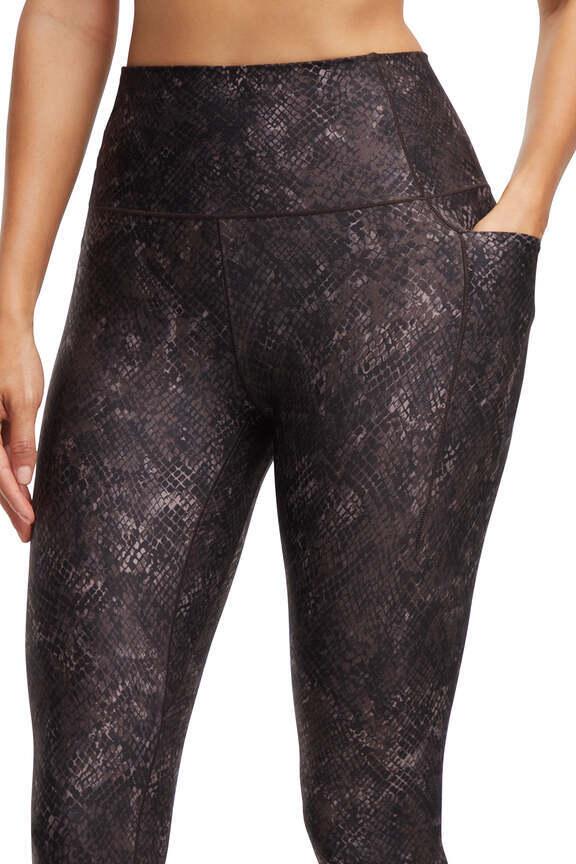 Kelly Side Pocket Legging, close-up view of fabric and stitching, showing visible design features and texture of the stretch knit fabric.. 