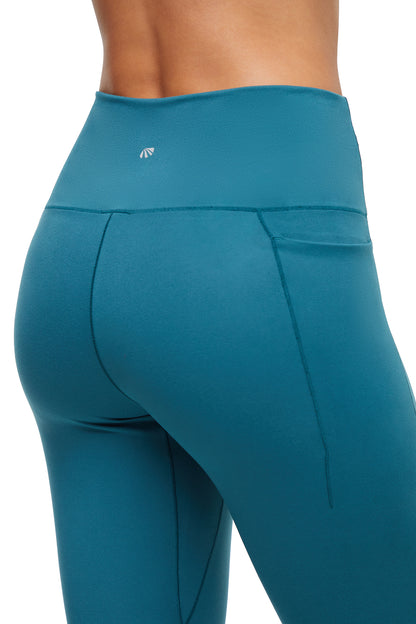 Kelly Side Pocket Legging, alternate angle view, showing visible design features and texture of the stretch knit fabric.. 
