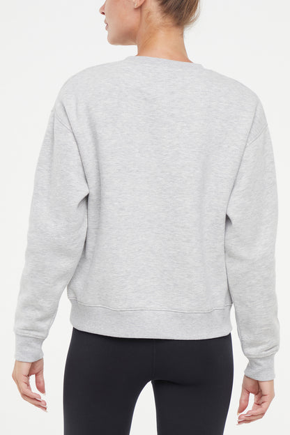 Camila Pullover, alternate angle view, showing visible design features and texture of the soft knit fabric.. 