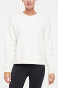 Camila Pullover, alternate angle view, showing visible design features and texture of the soft knit fabric.. #color_egret