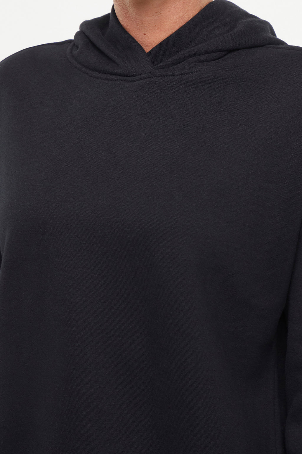 Camila Hoodie, close-up view of fabric and stitching, showing visible design features and texture of the soft fleece fabric.. #color_black