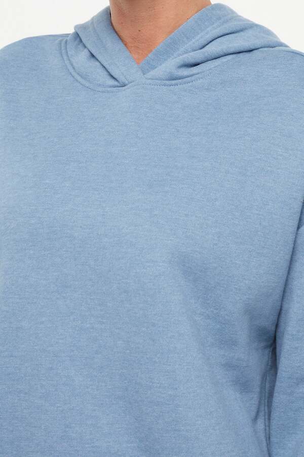 Camila Hoodie, back view, showing visible design features and texture of the soft fleece fabric.. 