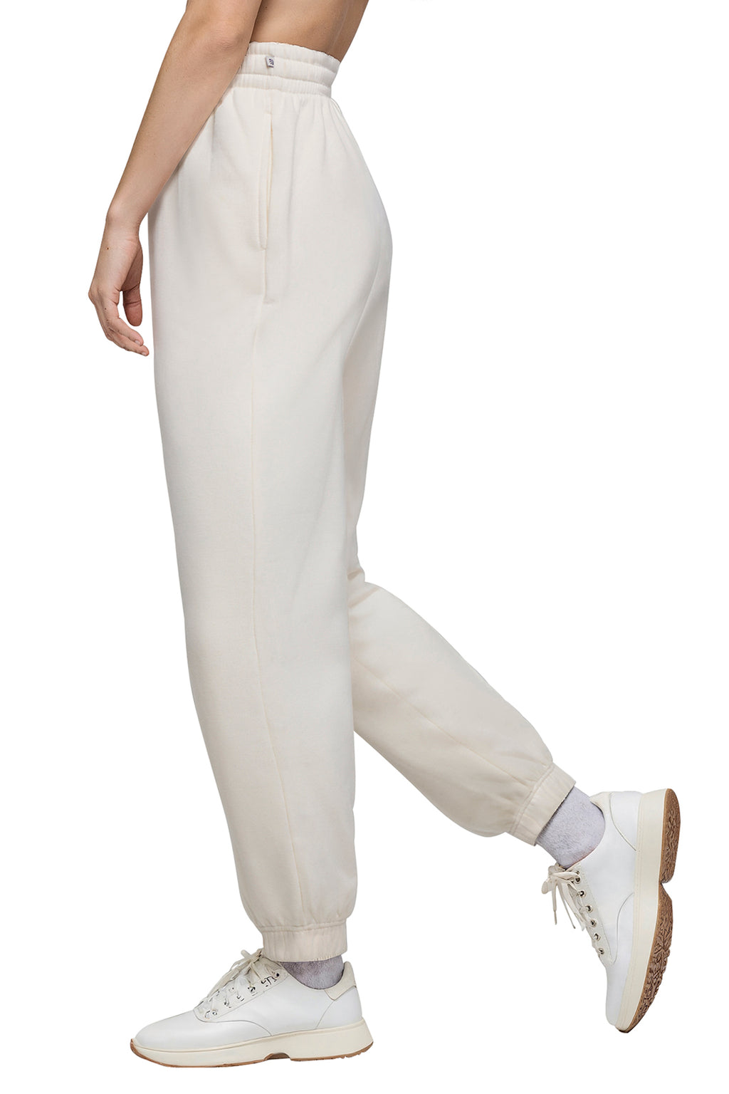 Camila Jogger, alternate angle view, showing visible design features and texture of the soft knit fabric.. #color_egret