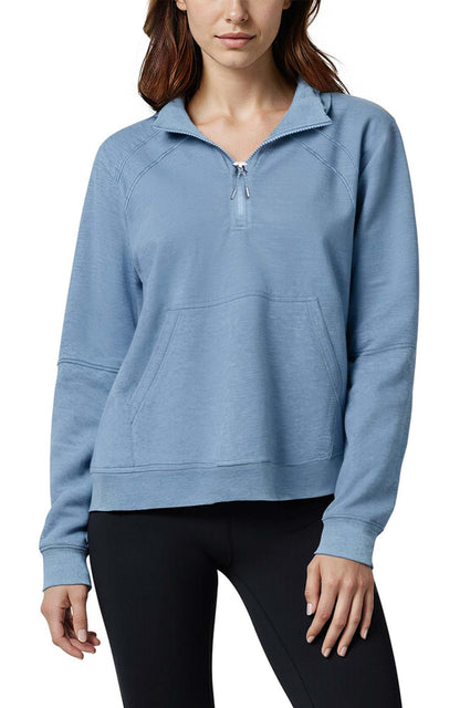 Camila 1/4 Zip Jacket, close-up view of fabric and stitching, showing visible design features and texture of the smooth woven fabric.. 