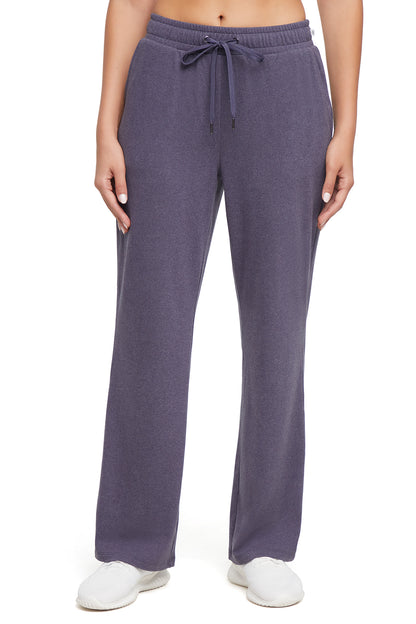 Riley Straight Leg Pant, close-up view of fabric and stitching, showing visible design features and texture of the durable stretch fabric.. 