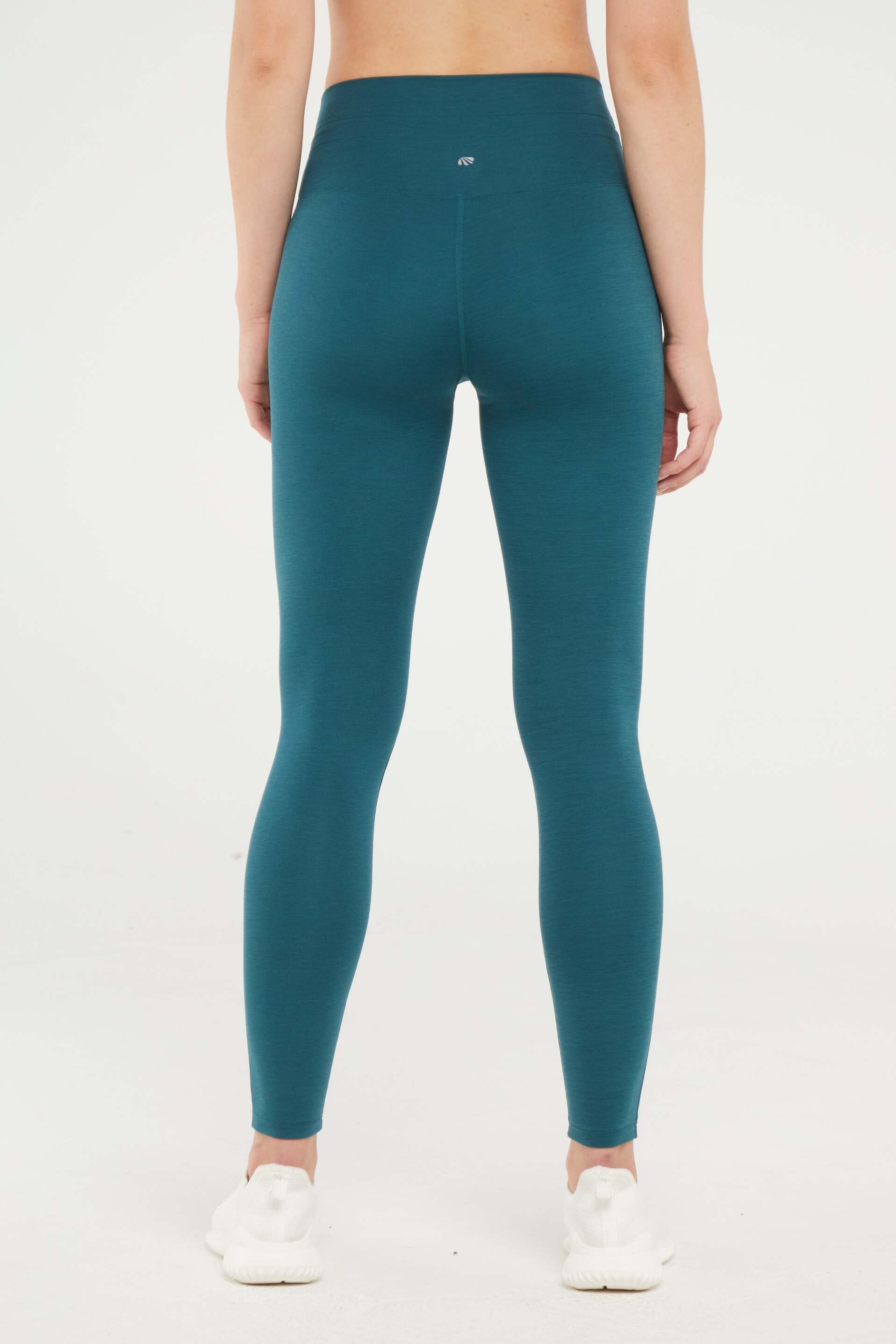 Lune Legging, alternate angle view, showing visible design features and texture of the stretch knit fabric.. 