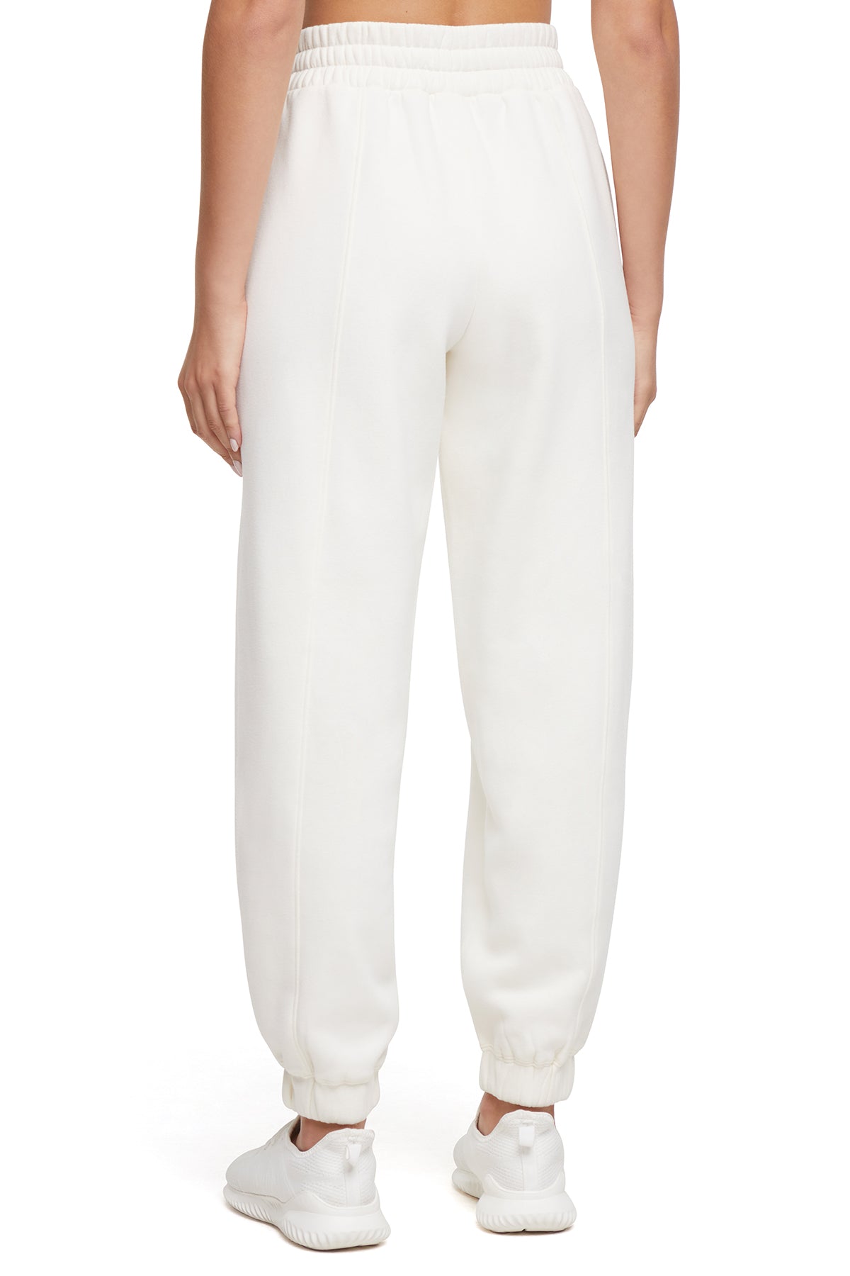 Calliope Jogger, side view showing pocket placement, showing visible design features and texture of the soft knit fabric.. 