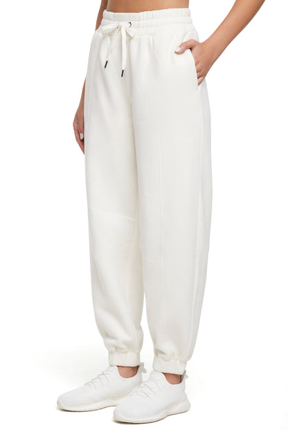 Calliope Jogger, front view, showing visible design features and texture of the soft knit fabric.. 