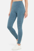 Luna Legging, close-up view of fabric and stitching, showing visible design features and texture of the stretch knit fabric.. #color_heather-tidal