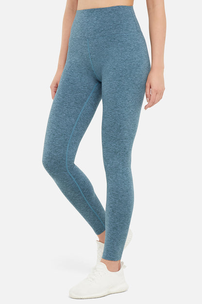 Luna Legging, close-up view of fabric and stitching, showing visible design features and texture of the stretch knit fabric.. 