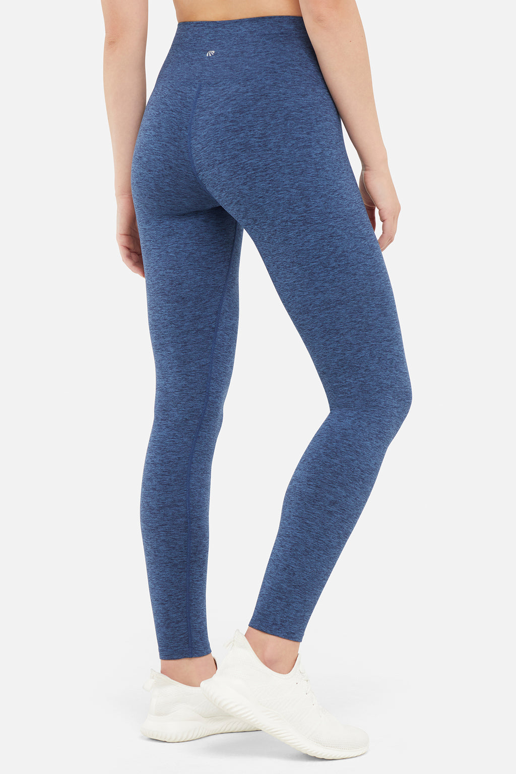 Luna Legging, alternate angle view, showing visible design features and texture of the stretch knit fabric.. #color_heather-total-eclipse