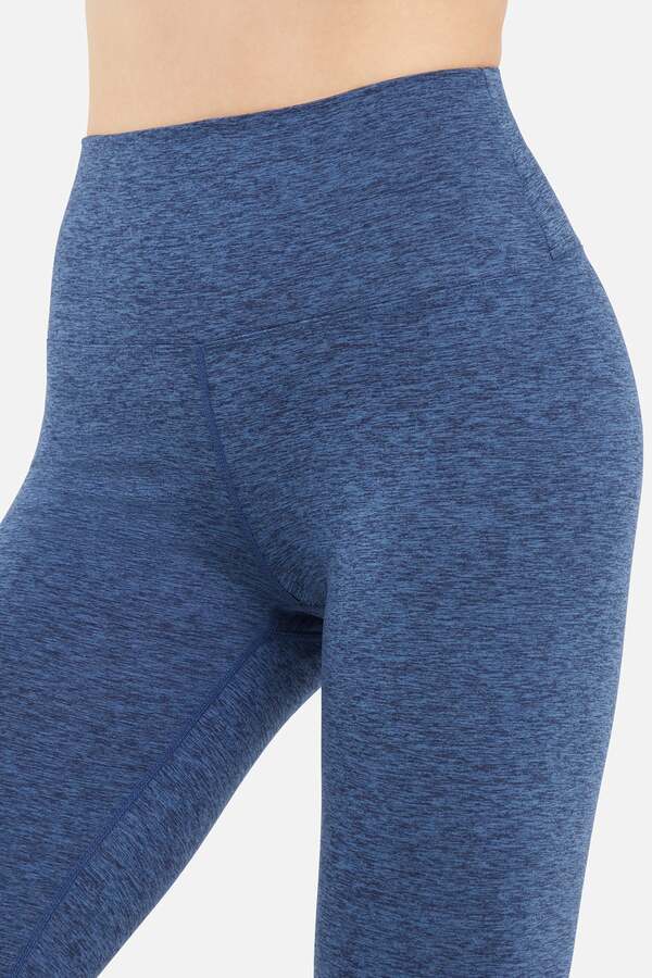 Luna Legging, alternate angle view, showing visible design features and texture of the stretch knit fabric.. #color_heather-total-eclipse