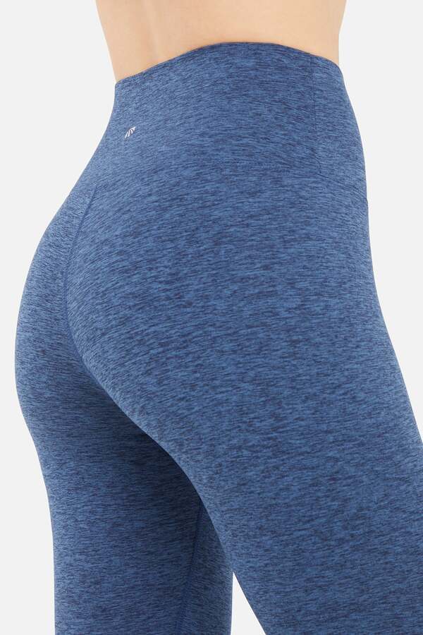 Luna Legging, alternate angle view, showing visible design features and texture of the stretch knit fabric.. #color_heather-total-eclipse