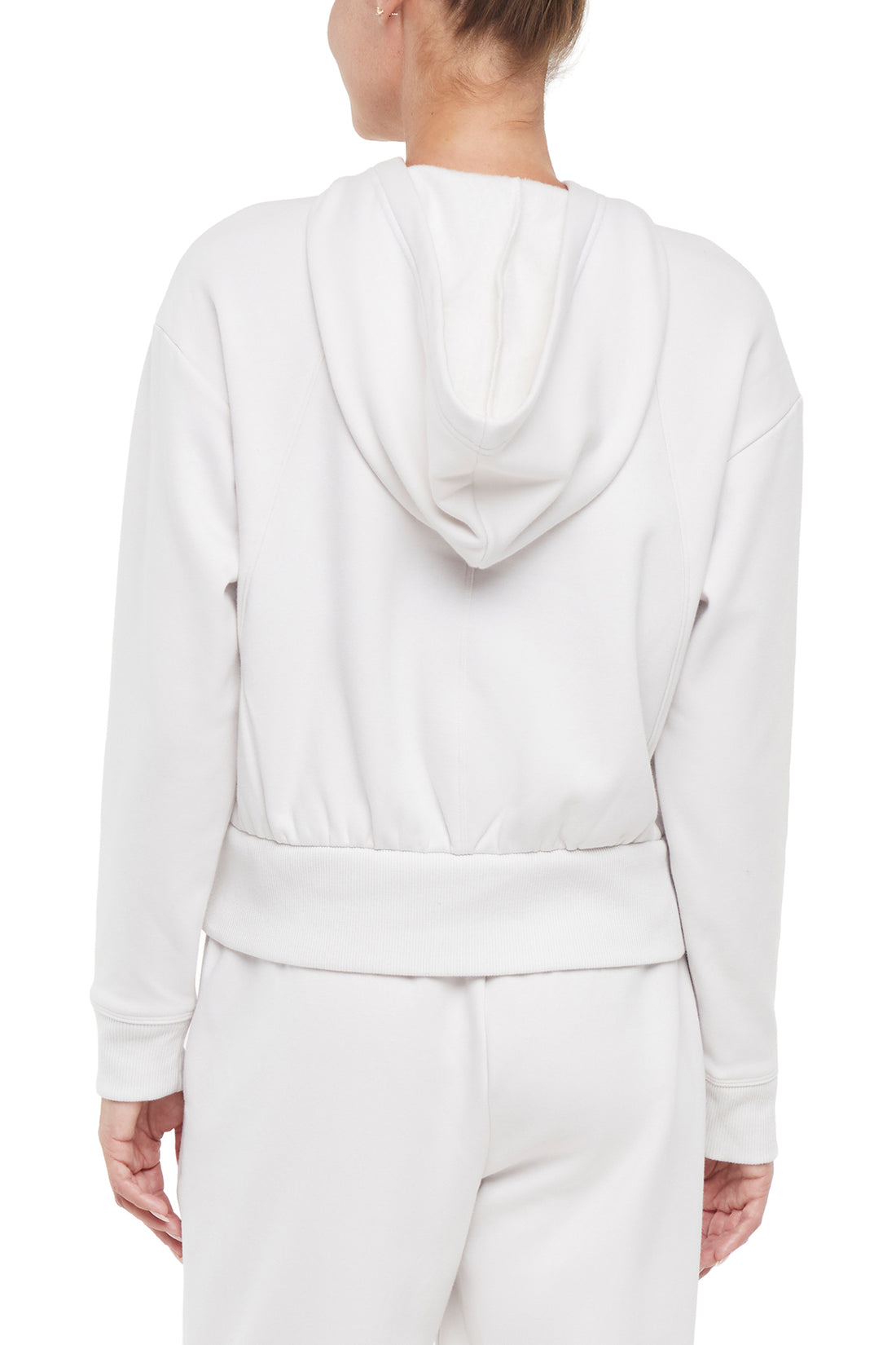 Roxie 1/4 Zip Hoodie, side view showing pocket placement, showing visible design features and texture of the soft fleece fabric.. 