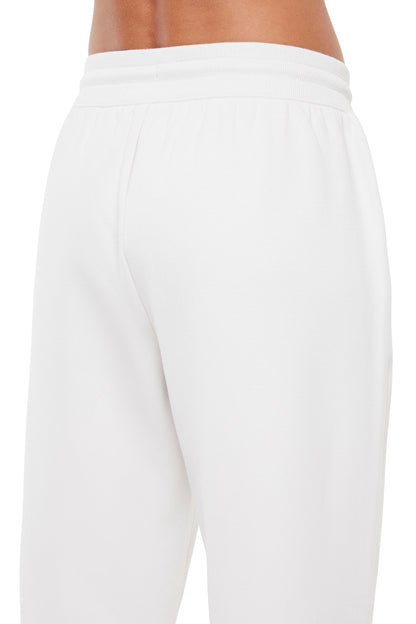 Roxie Pant, side view showing pocket placement, showing visible design features and texture of the durable stretch fabric.. 