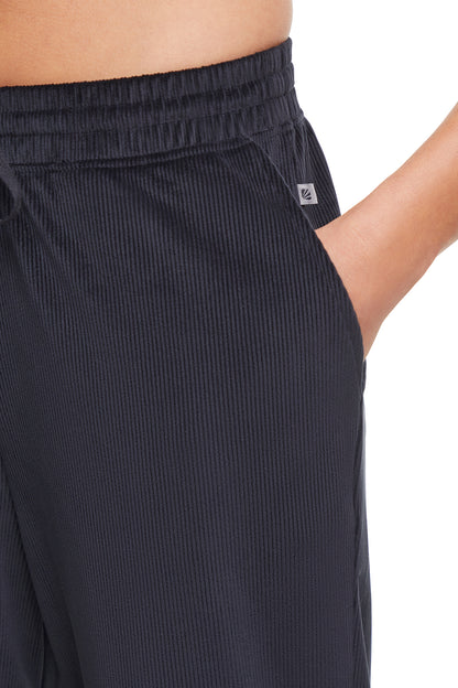 Stormi Pant, alternate angle view, showing visible design features and texture of the durable stretch fabric.. 