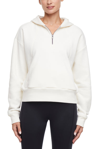 Calliope 1/4 Zip Hoodie, close-up view of fabric and stitching, showing visible design features and texture of the soft fleece fabric.. 