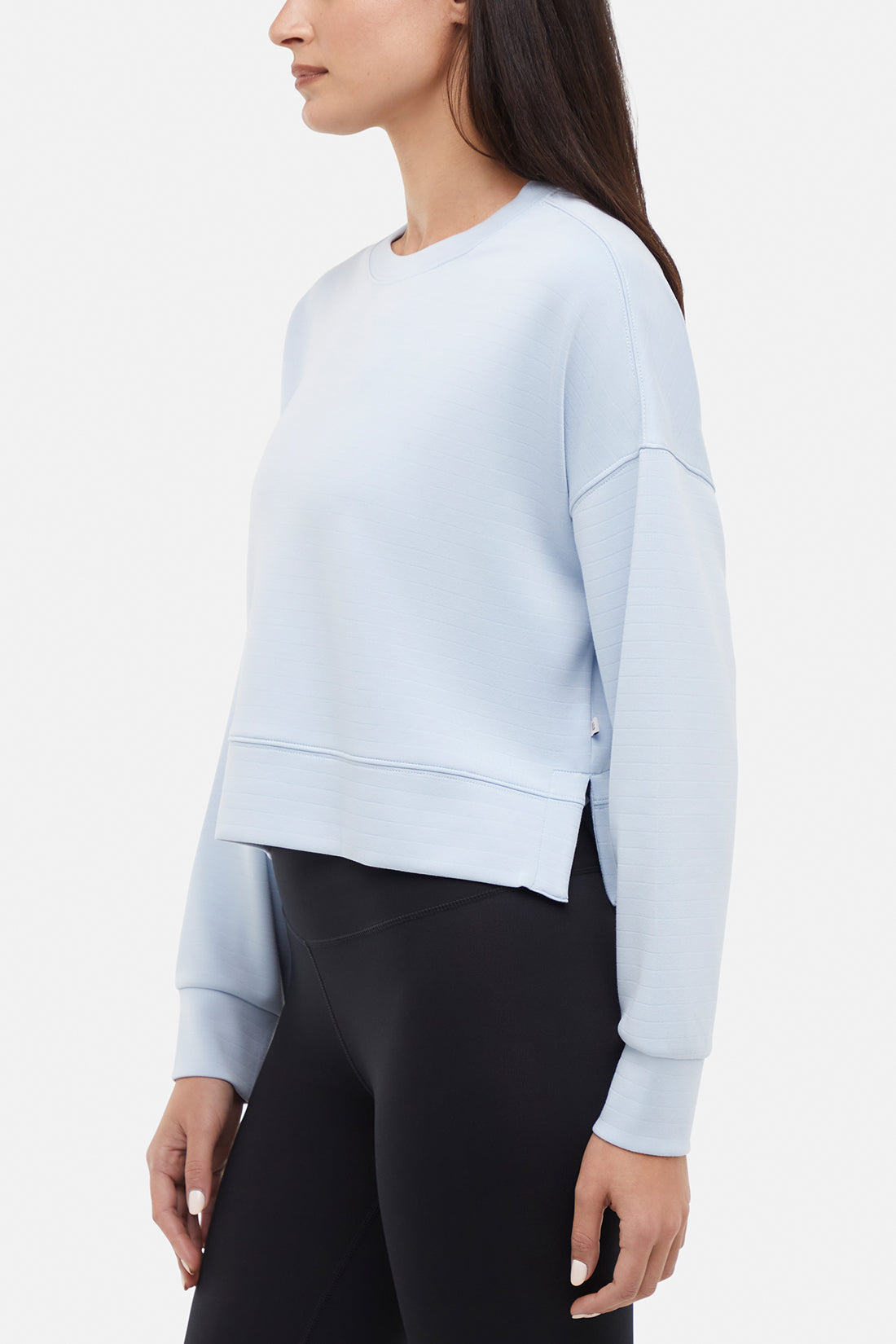 Becky Long Sleeve Crew Neck, back view, showing visible design features and texture of the soft knit fabric.