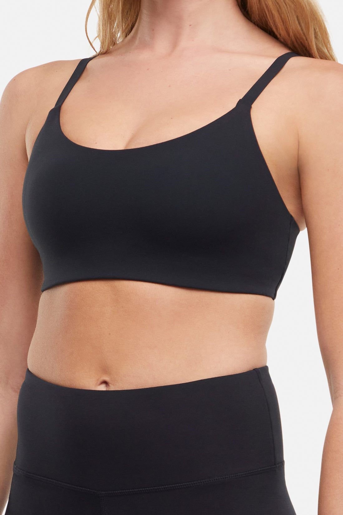 Alba Sports Bra, back view, showing visible design features and texture of the soft knit fabric.