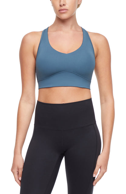 Rubina Sports Bra, front view, showing visible design features and texture of the soft knit fabric.. 