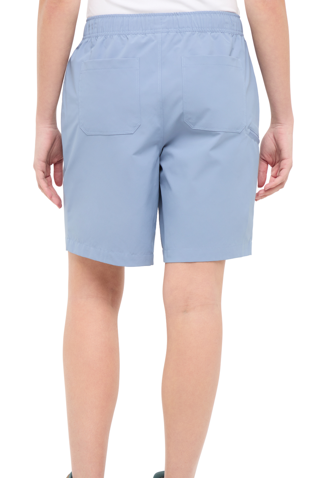 Back view of woman wearing light blue shorts, standing on a white background. #color_troposphere