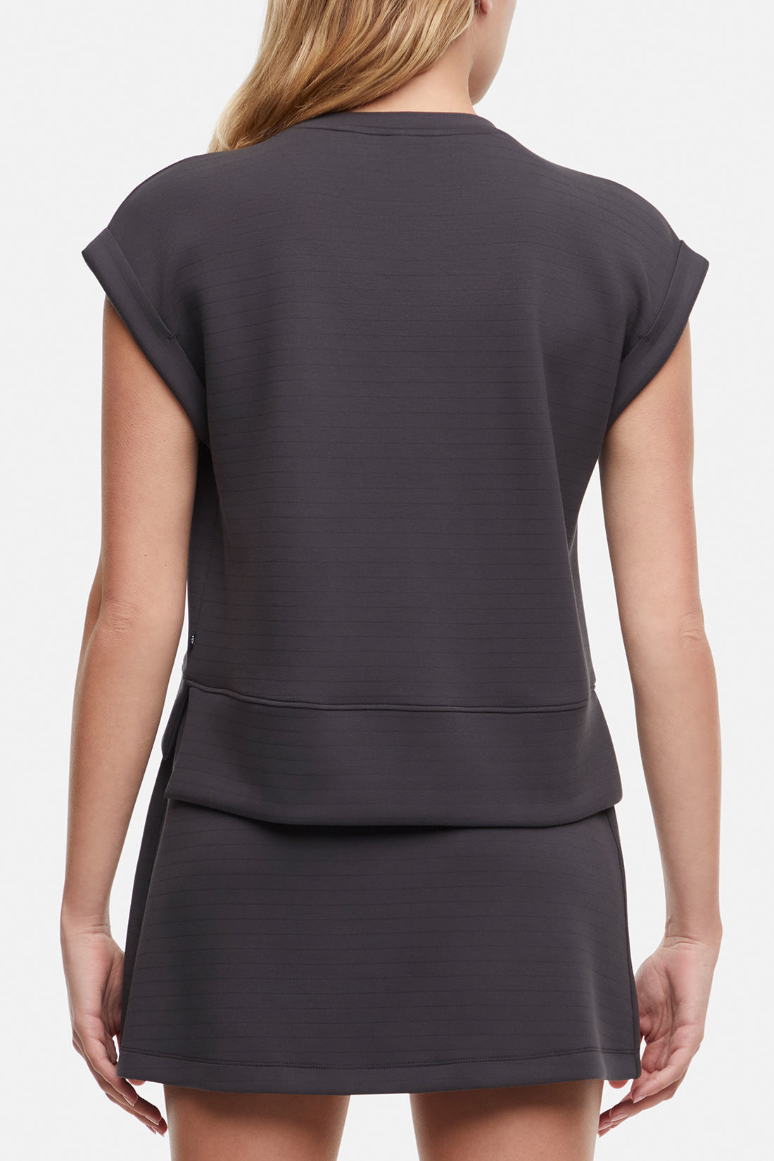 Becky Short Sleeve Crew Neck Top, side view showing pocket placement, showing visible design features and texture of the soft knit fabric.