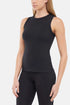 Quarter front view of woman wearing a black ribbed-knit sleeveless tank top and black leggings on a light gray background. 