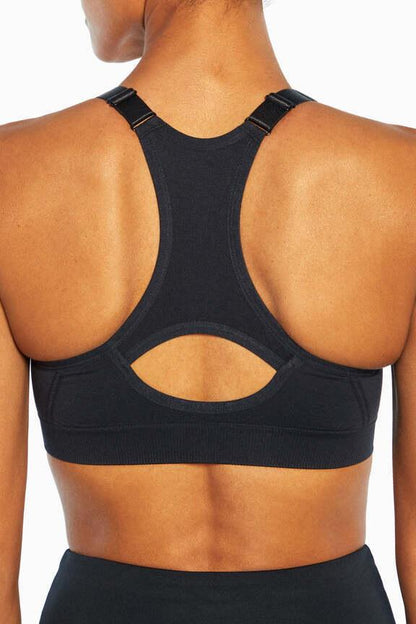 Savannah Seamless Front Zip Sports Bra, alternate angle view, showing visible design features and texture of the soft knit fabric.. 