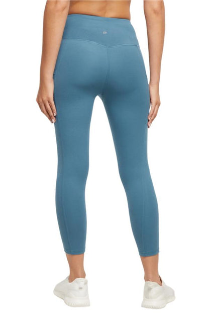 Drew Side Pocket Tummy Control Mid Calf Capri - Tapestry, side view showing pocket placement, showing visible design features and texture of the.. 