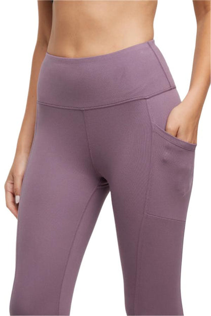 Drew Side Pocket Tummy Control Mid Calf Capri - Black Plum, alternate angle view, showing visible design features and texture of the soft knit fabric.. 