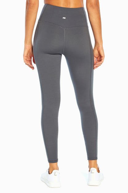 Olivia High Rise Tummy Control Legging - Turbulence, close-up view of fabric and stitching, showing visible design features and texture of the.. 