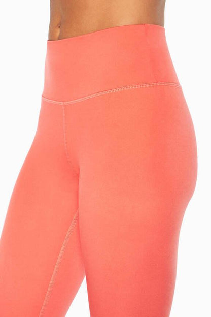 Zen Ankle Legging, alternate angle view, showing visible design features and texture of the stretch knit fabric.. 
