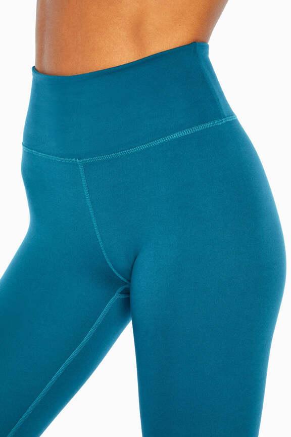 Zen Ankle Legging, alternate angle view, showing visible design features and texture of the stretch knit fabric.. 