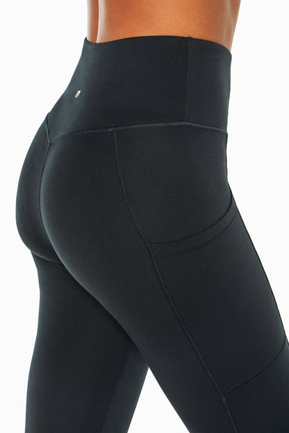 Talia Side Pocket Tummy Control Legging, alternate angle view, showing visible design features and texture of the stretch knit fabric.. 