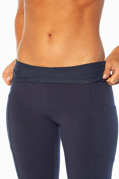 Eclipse Side Pocket Tummy Control Yoga Pant, alternate angle view, showing visible design features and texture of the durable stretch fabric.. 