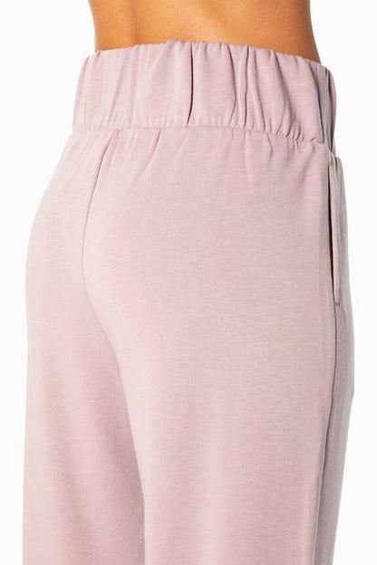 Palmer Fleece Jogger, alternate angle view, showing visible design features and texture of the soft knit fabric.. 