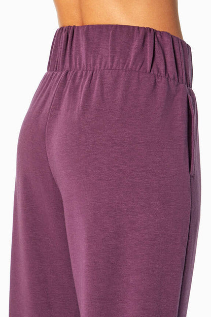 Palmer Fleece Jogger, alternate angle view, showing visible design features and texture of the soft knit fabric.. 