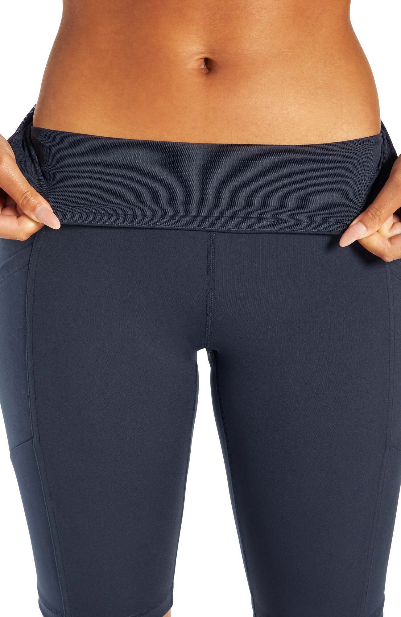 Olivia Side Pocket Tummy Control Bermuda Shorts, alternate angle view, showing visible design features and texture of the soft knit fabric.. 